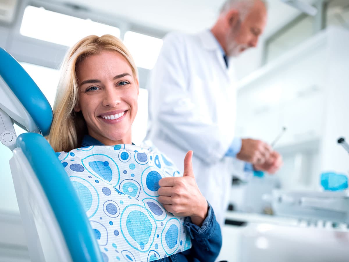 Happy Woman After A Tooth Extraction Procedure In Clearwater