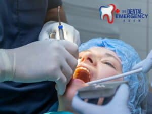 Dental professional performing the tooth extraction process on a patient in a clinical setting
