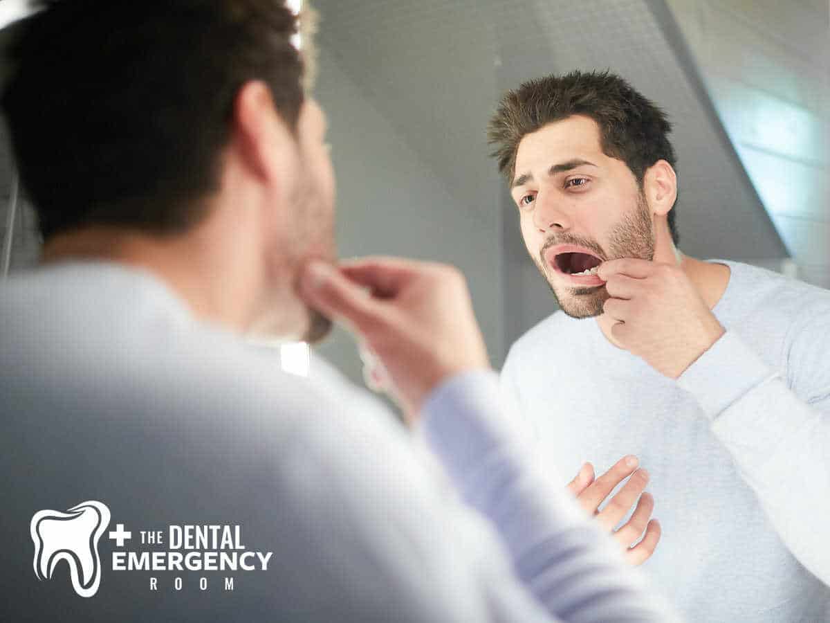 A man checking his dental appliances in Clearwater, FL